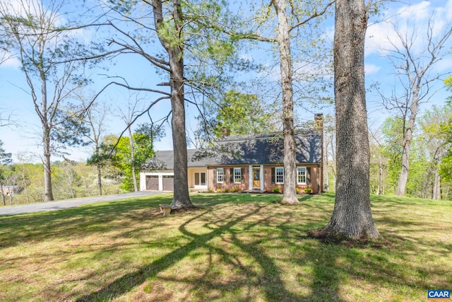 330 Carrsbrook Dr, Charlottesville, VA 22901 - view of front of property featuring an attached garage, driveway, a front yard, and brick siding