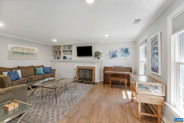 330 Carrsbrook Dr, Charlottesville, VA 22901 - living room with ornamental molding, hardwood / wood-style floors, a brick fireplace, recessed lighting, and baseboards