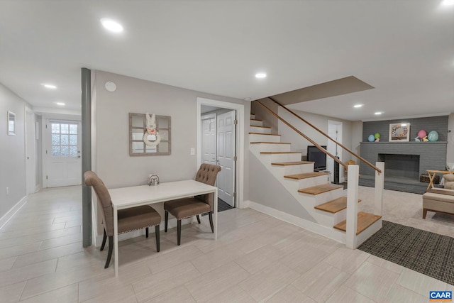 330 Carrsbrook Dr, Charlottesville, VA 22901 - dining space with stairway, recessed lighting, a brick fireplace, and baseboards