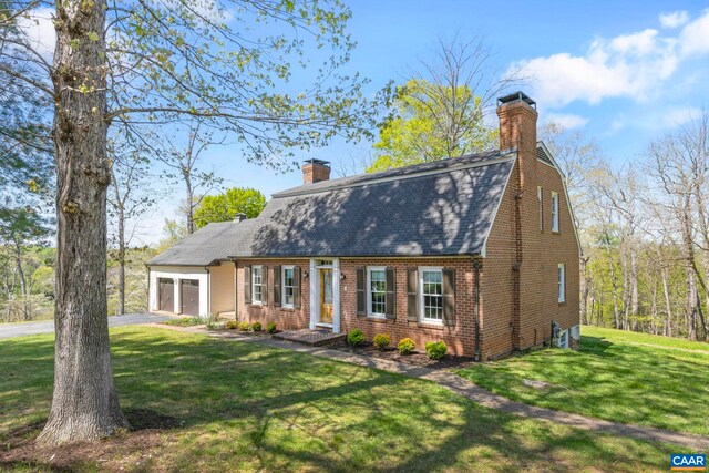 330 Carrsbrook Dr, Charlottesville, VA 22901 - dutch colonial featuring a chimney, a garage, asphalt driveway, a front yard, and brick siding