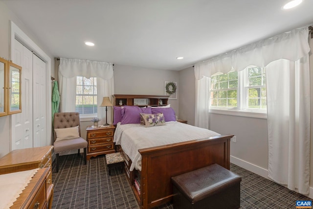 330 Carrsbrook Dr, Charlottesville, VA 22901 - bedroom with multiple windows, dark carpet, recessed lighting, and baseboards