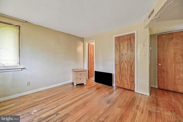 102 Washington St E, Remington, VA 22734 - unfurnished bedroom featuring wood finished floors and baseboards