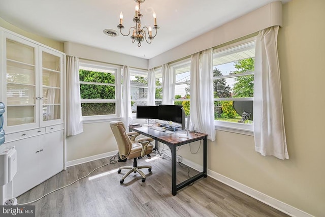 102 Washington St E, Remington, VA 22734 - office area featuring baseboards, wood finished floors, plenty of natural light, and a chandelier