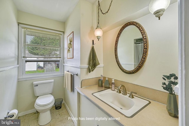 102 Washington St E, Remington, VA 22734 - full bath featuring toilet, vanity, and baseboards