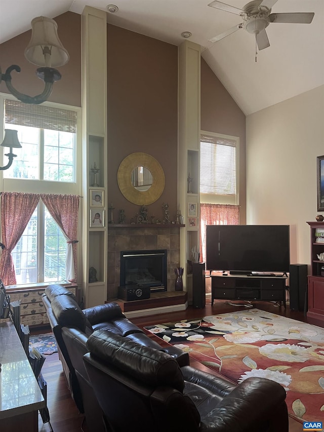 1330 Elderberry Pl, Earlysville, VA 22936 - living area with lofted ceiling, a fireplace, a ceiling fan, and wood finished floors