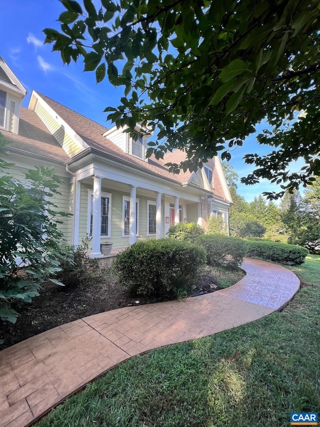 1330 Elderberry Pl, Earlysville, VA 22936 - view of home's exterior featuring a lawn and a porch