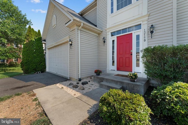 12190 Remland Ct, Remington, VA 22734 - property entrance with an attached garage and asphalt driveway