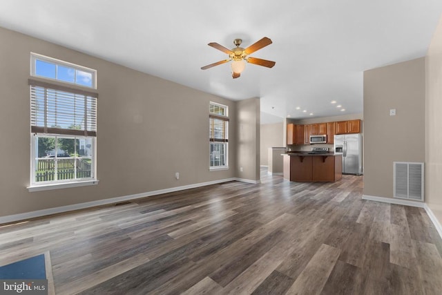 12190 Remland Ct, Remington, VA 22734 - unfurnished living room featuring healthy amount of natural light, wood finished floors, a ceiling fan, and recessed lighting