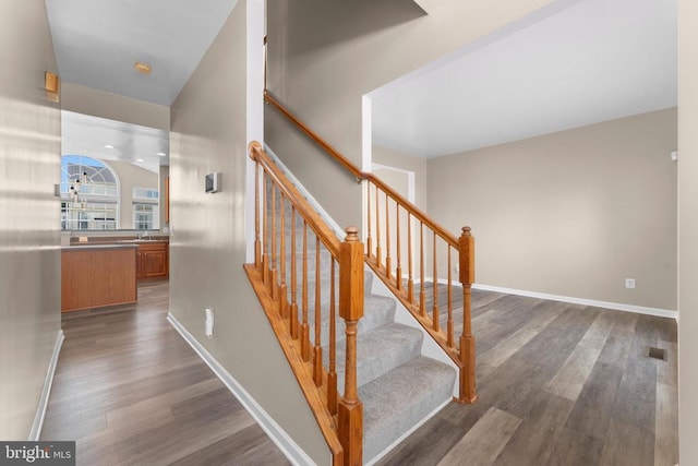 12190 Remland Ct, Remington, VA 22734 - staircase featuring wood finished floors and baseboards