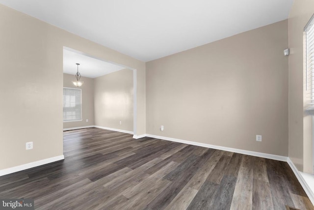 12190 Remland Ct, Remington, VA 22734 - spare room with dark wood-style floors and a chandelier