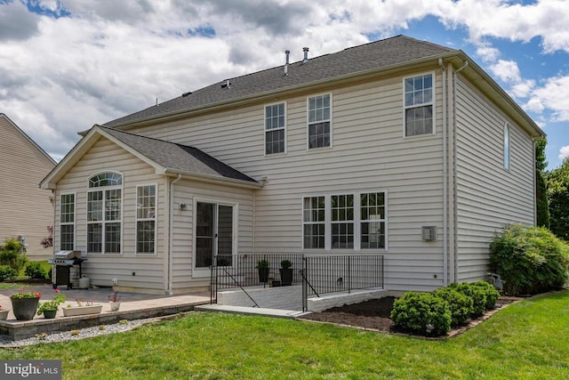 9016 Laurel Oak Ln, Fredericksburg, VA 22407 - rear view of house featuring a patio and a lawn