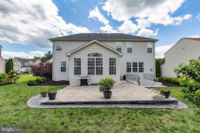 9016 Laurel Oak Ln, Fredericksburg, VA 22407 - rear view of property featuring a patio area and a lawn