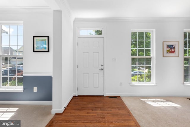 9016 Laurel Oak Ln, Fredericksburg, VA 22407 - foyer entrance with crown molding, wood finished floors, and baseboards