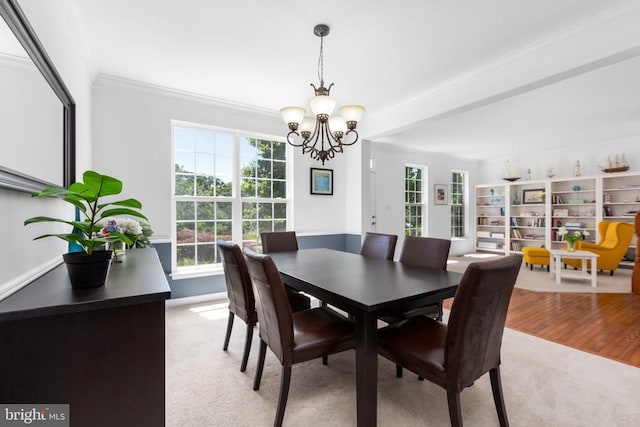 9016 Laurel Oak Ln, Fredericksburg, VA 22407 - dining area featuring a chandelier, light colored carpet, ornamental molding, and baseboards