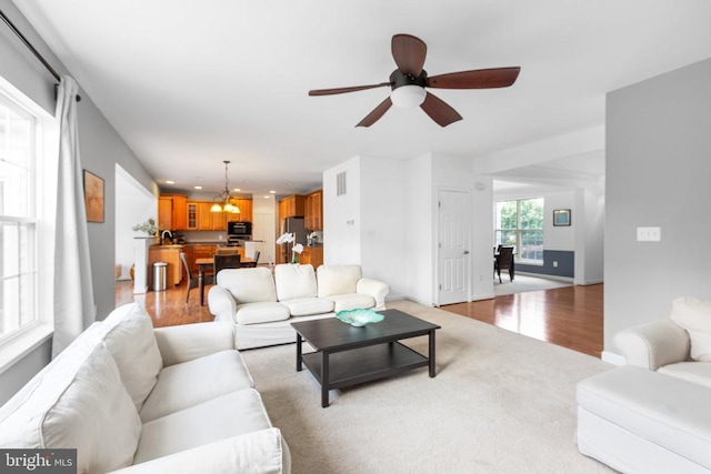 9016 Laurel Oak Ln, Fredericksburg, VA 22407 - living area with a ceiling fan, a chandelier, light wood-style floors, and recessed lighting