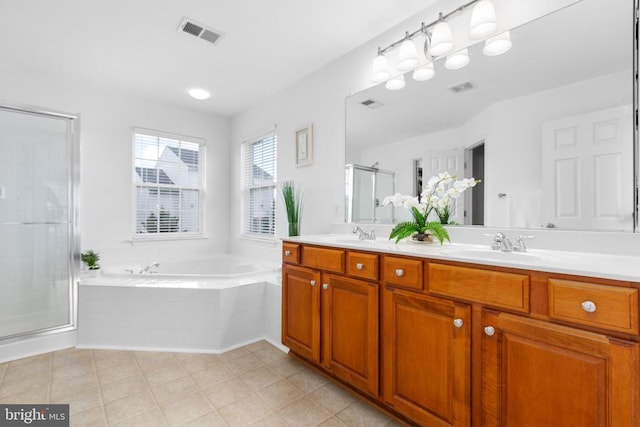 9016 Laurel Oak Ln, Fredericksburg, VA 22407 - bathroom with double vanity, a bath, a shower stall, and tile patterned flooring