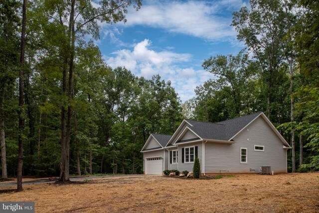 79 Hickory Cir, Mineral, VA 23117 - view of home's exterior featuring a garage and a shingled roof