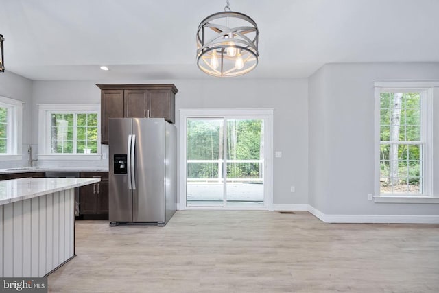 79 Hickory Cir, Mineral, VA 23117 - kitchen featuring stainless steel fridge, a chandelier, plenty of natural light, and recessed lighting