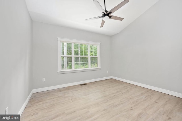 79 Hickory Cir, Mineral, VA 23117 - spare room with wood finished floors, a ceiling fan, and vaulted ceiling
