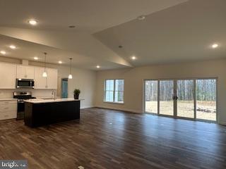 Old Lawyers Rd, Unionville, VA 22567 - living room featuring dark wood-style floors, vaulted ceiling, and recessed lighting