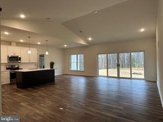 Old Lawyers Rd, Unionville, VA 22567 - unfurnished living room featuring dark wood-style flooring, recessed lighting, vaulted ceiling, and baseboards