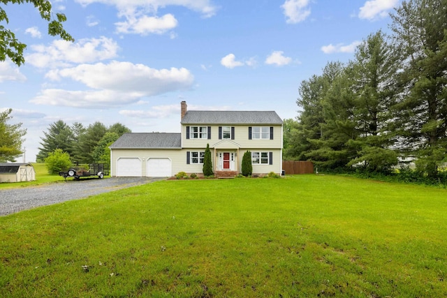 701 Horseshoe Cir, Stuarts Draft, VA 24477 - colonial inspired home with a garage, gravel driveway, a chimney, and a front lawn