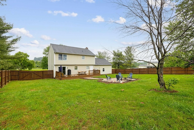 701 Horseshoe Cir, Stuarts Draft, VA 24477 - rear view of house with a wooden deck, a fire pit, and a gate