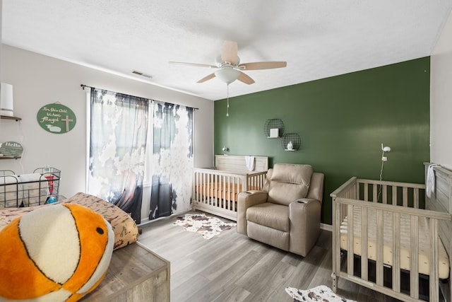 701 Horseshoe Cir, Stuarts Draft, VA 24477 - bedroom with wood finished floors and ceiling fan