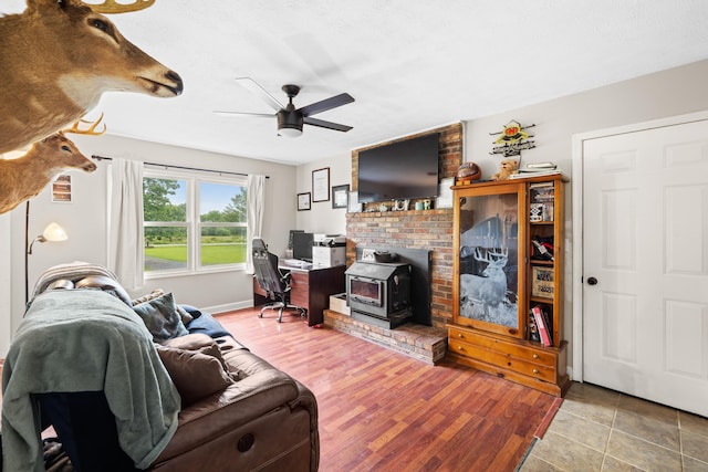 701 Horseshoe Cir, Stuarts Draft, VA 24477 - living room with a ceiling fan and a wood stove
