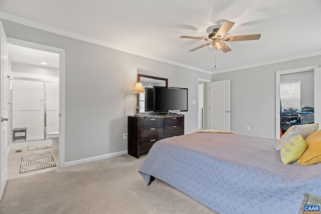 bedroom with baseboards, ensuite bathroom, ornamental molding, and light colored carpet