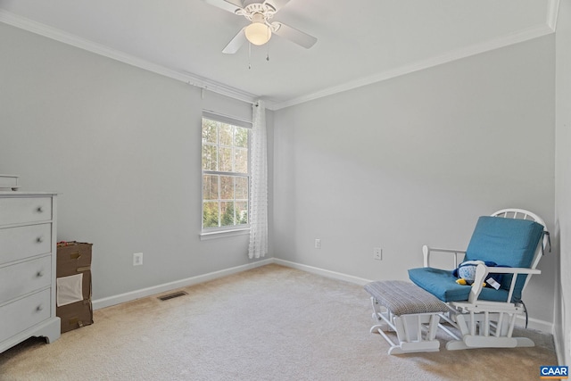 unfurnished room featuring crown molding, carpet flooring, baseboards, and visible vents