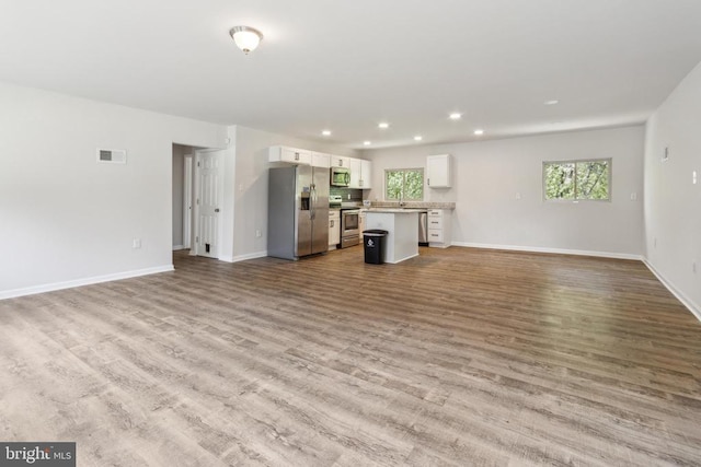 92 Aspen Hill Rd, Mineral, VA 23117 - unfurnished living room with recessed lighting, wood finished floors, and baseboards