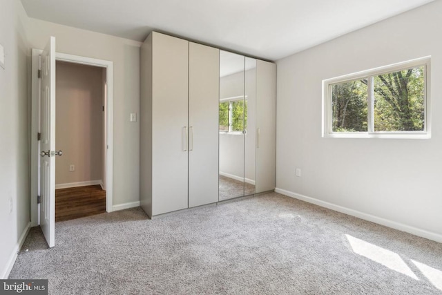 92 Aspen Hill Rd, Mineral, VA 23117 - unfurnished bedroom with carpet floors, baseboards, and a closet