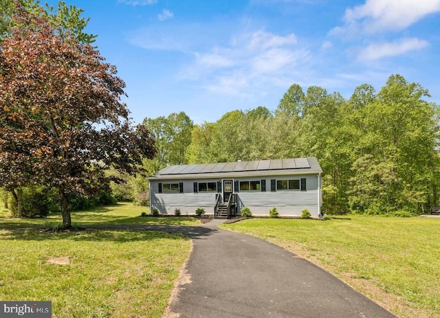 92 Aspen Hill Rd, Mineral, VA 23117 - view of front of property featuring a front yard and roof mounted solar panels