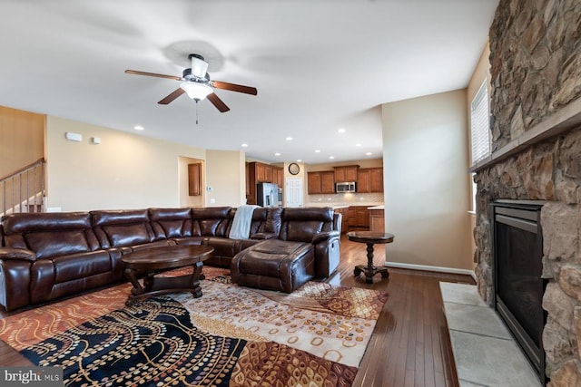 5505 Spring Bluff Ct, Fredericksburg, VA 22407 - living area with a ceiling fan, wood-type flooring, a stone fireplace, and recessed lighting