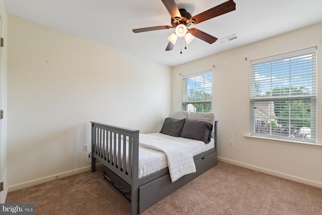 5505 Spring Bluff Ct, Fredericksburg, VA 22407 - bedroom with baseboards, carpet, and ceiling fan