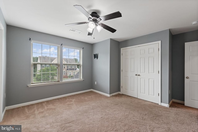 5505 Spring Bluff Ct, Fredericksburg, VA 22407 - unfurnished bedroom featuring carpet, a closet, and ceiling fan