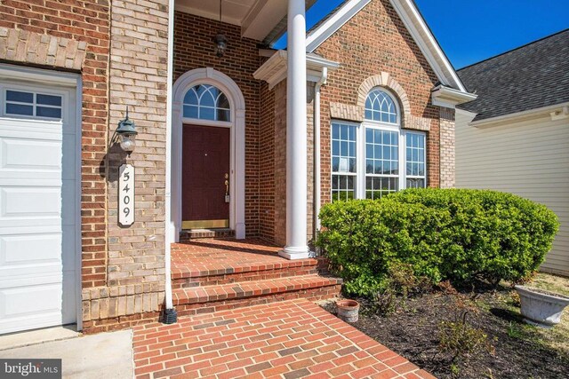 5409 Rich Mountain Way E, Fredericksburg, VA 22407 - property entrance featuring brick siding and a porch