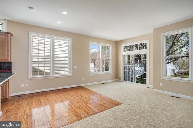 5409 Rich Mountain Way E, Fredericksburg, VA 22407 - unfurnished dining area with baseboards, healthy amount of natural light, light wood-style flooring, and recessed lighting