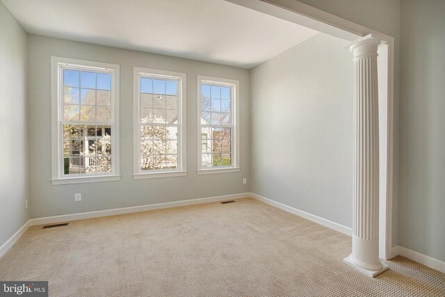5409 Rich Mountain Way E, Fredericksburg, VA 22407 - unfurnished room featuring ornate columns, light colored carpet, and healthy amount of natural light