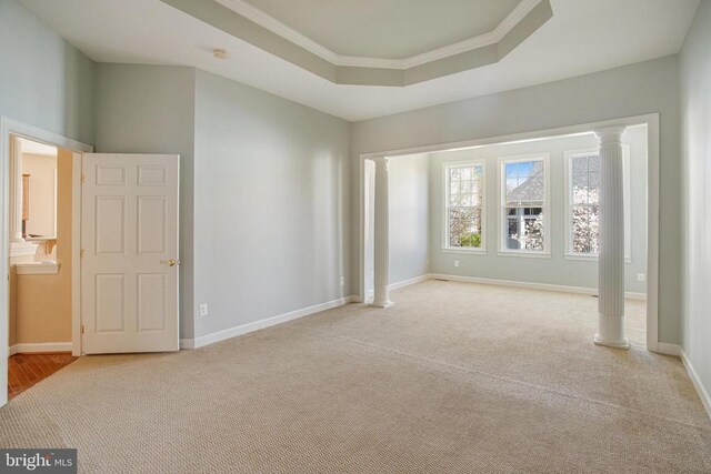 5409 Rich Mountain Way E, Fredericksburg, VA 22407 - empty room with a raised ceiling, carpet floors, baseboards, crown molding, and ornate columns