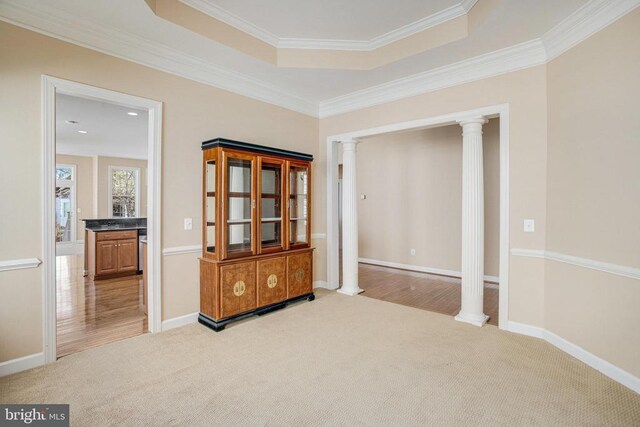 5409 Rich Mountain Way E, Fredericksburg, VA 22407 - spare room with decorative columns, carpet floors, crown molding, and baseboards