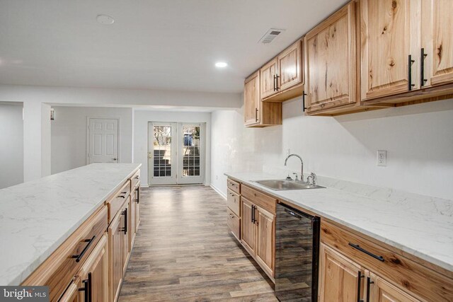 5409 Rich Mountain Way E, Fredericksburg, VA 22407 - kitchen featuring wine cooler, a sink, wood finished floors, light stone countertops, and french doors