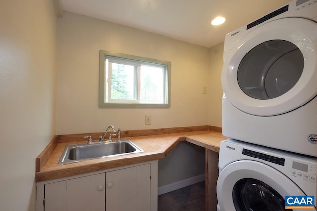 2256 Adial Rd, Faber, VA 22938 - laundry room featuring recessed lighting, a sink, tile patterned flooring, stacked washing maching and dryer, and cabinet space