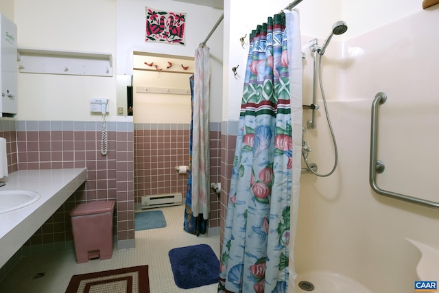 2256 Adial Rd, Faber, VA 22938 - bathroom with a shower stall, tile walls, tile patterned flooring, and a wainscoted wall