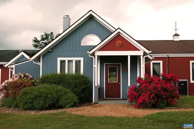 2256 Adial Rd, Faber, VA 22938 - view of front of house with a chimney, a front yard, and central AC
