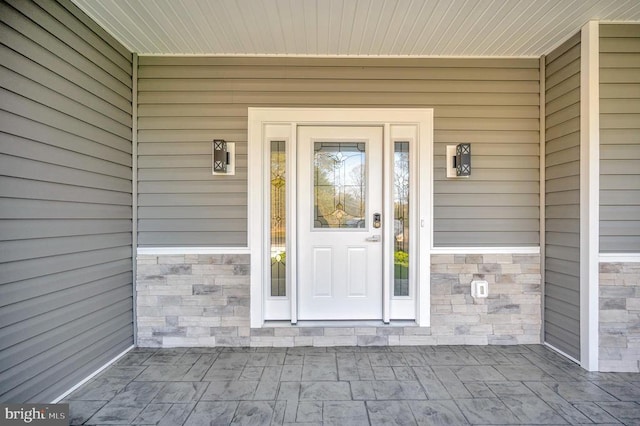 400 Constitution Blvd, Locust Grove, VA 22508 - view of exterior entry featuring stone siding and covered porch