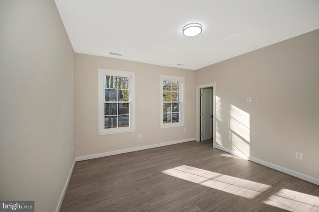 400 Constitution Blvd, Locust Grove, VA 22508 - empty room featuring baseboards and wood finished floors