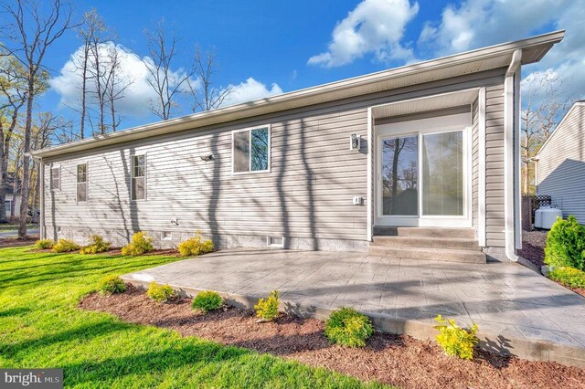 400 Constitution Blvd, Locust Grove, VA 22508 - back of house featuring a patio area, a yard, and entry steps