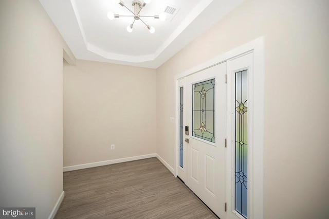 400 Constitution Blvd, Locust Grove, VA 22508 - foyer featuring a chandelier, a tray ceiling, wood finished floors, and baseboards